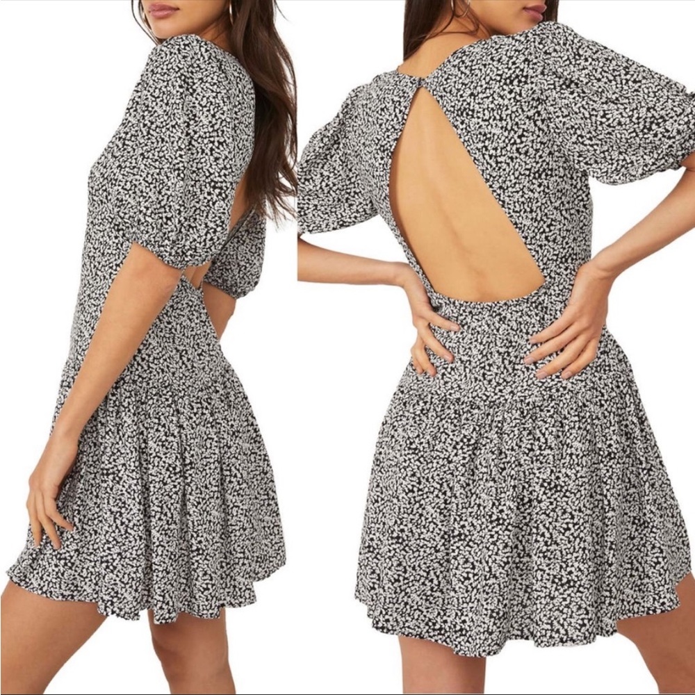 Elegant Black and White Open-Back Dress